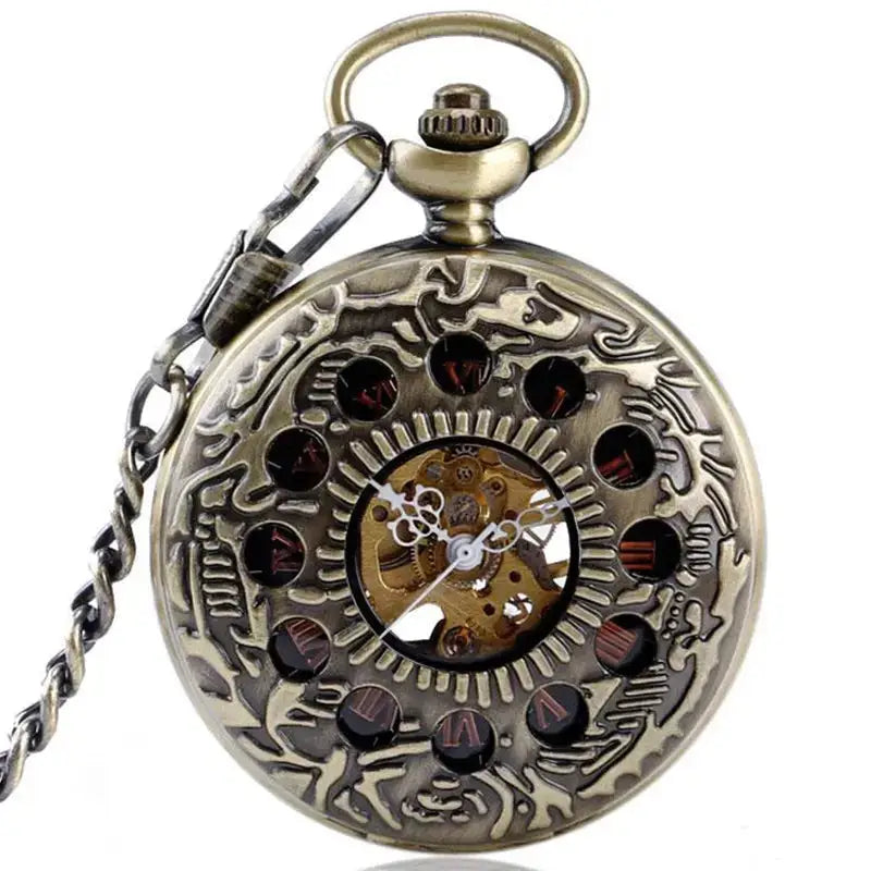 Vintage stil udsmykket bronze lommeur, der viser interne mekanismer